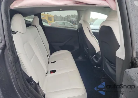 2023 Tesla Model Y from USA, damaged, VIN 7SAYGDEE6PA116003